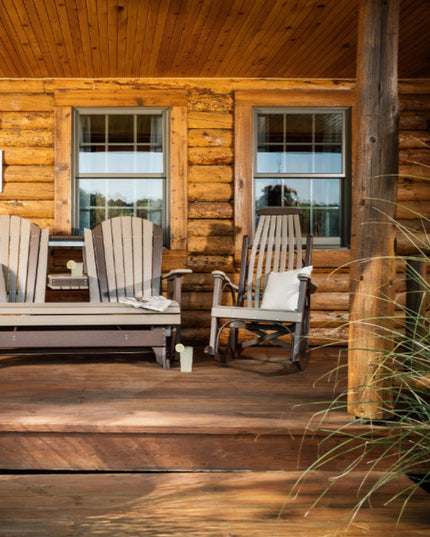 LuxCraft 5 foot adirondack glider weather wood and chestnut brown alongside LuxCraft grandpa's rocker