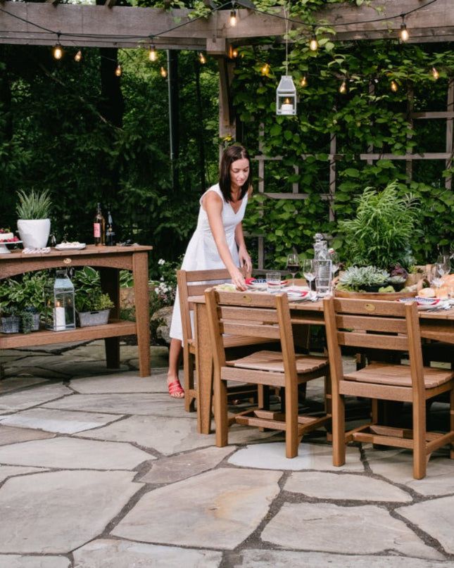 Lux craft island, side chair featured in mahogany with an LuxCraft island table.