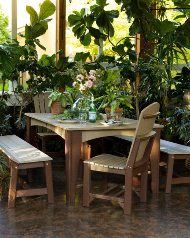 LuxCraft Adirondack side chair shown with LuxCraft island dining table (44" x 72" rectangular) and Café dining benches (72") in Weatherwood and chestnut brown