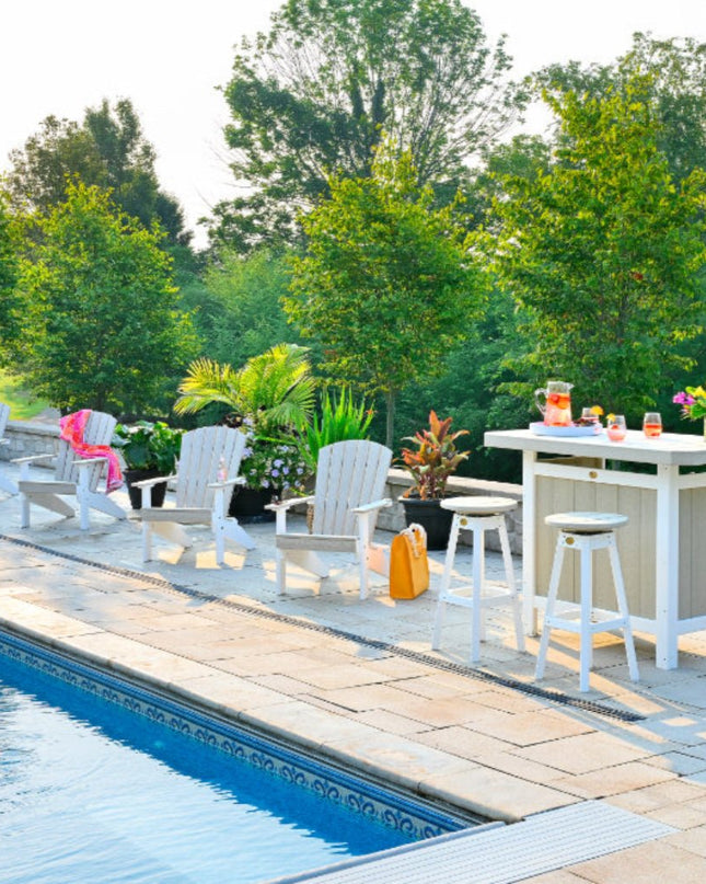 LuxCraft Poly Serving Bar featured in Birch White with Bar Stools and Adirondack Chairs